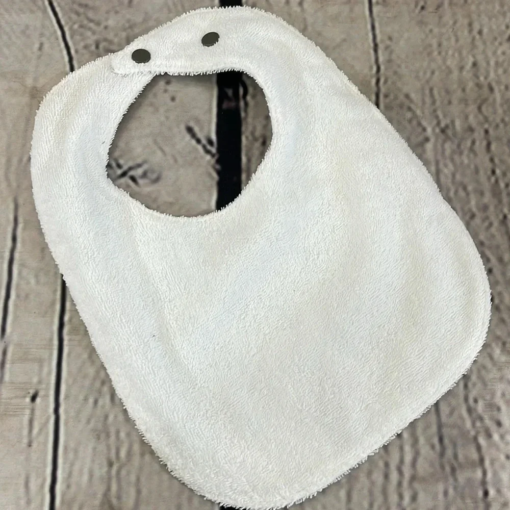 Designer hand crafted bib